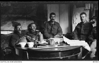 Officers of the 2nd Australian Tunnelling Company in their dugout. Left to right, Captain F. G. Phippard; Lieutenant (Lt) Cecil Herbert Blumer; Lt L. S. Lambert and Lt J. Malcomsen [ jpg ]