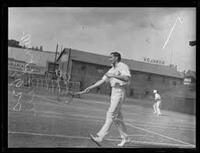 Tennis player Rupert Wertheim hitting a backhand [ jpg ]
